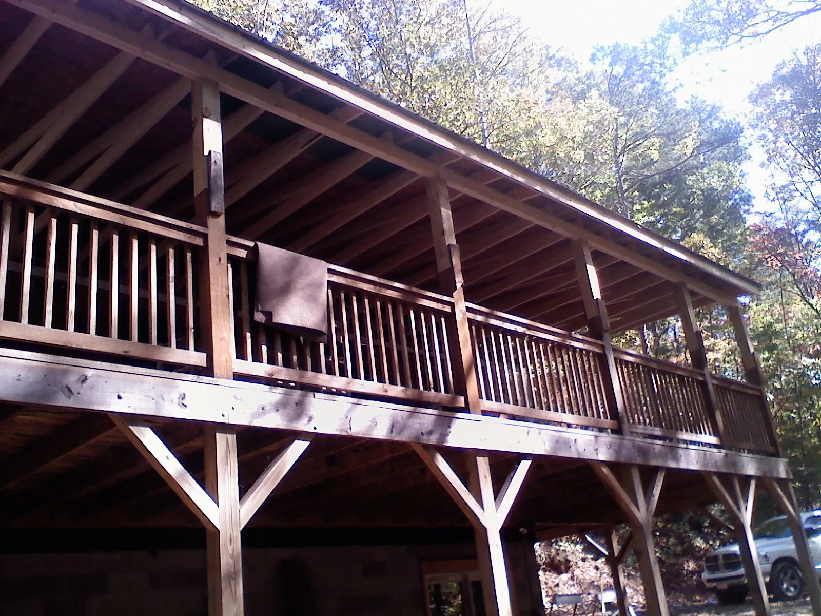 Timber framing under a new elevated porch and deck — Roof Leak Repair in Nuevo by Roofing Brothers